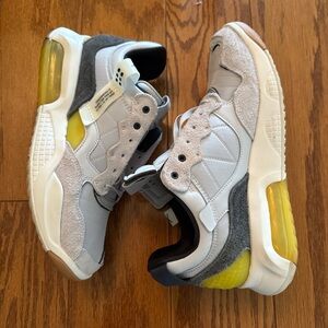 Jordan Sneakers with Gray and Yellow Accents size 10.